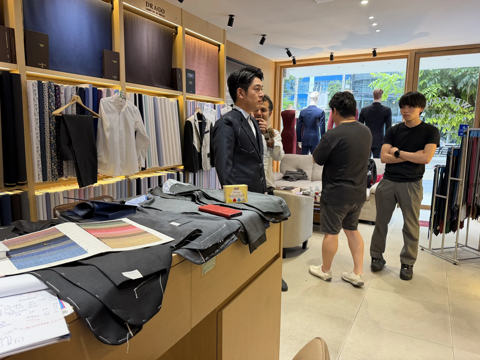Class Bespoke consultation with garments and cloth in the showroom