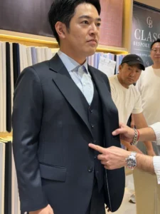 Class Bespoke navy suit fitting in the showroom